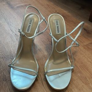 Silver heels by Steve Madden